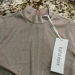 NWT blush glitter bodysuit M